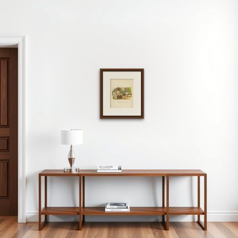 Antique Print of an Indonesian Tailor, 1909, shown framed on a wall, true to size