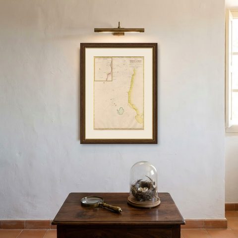 Large Antique Map of the west coast of Celebes, Sulawesi, Indonesia, shown framed on a wall, true to size