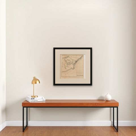 Antique Map of the Bolaang Mongondow District on Sulawesi by Stemler, c.1875, shown framed on a wall, true to size