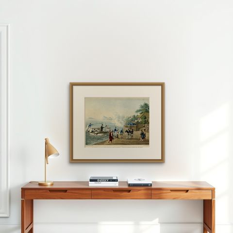 Print of the French Disembark at the Portugese Settlement of Dille, Timor, 1825, shown framed on a wall, true to size