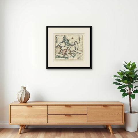 Antique Map of the Philippines & Eastern Indonesia: Spice Islands by Tirion 1738, shown framed on a wall, true to size