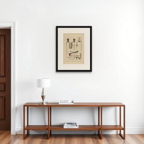 Print Weapons and Tools of Timor & Solor 'Indonesia' by Temminck, circa 1840, shown framed on a wall, true to size