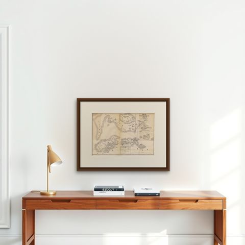 Antique Map of the Maluku Islands 'Ambon' by Stemler, 1874, shown framed on a wall, true to size