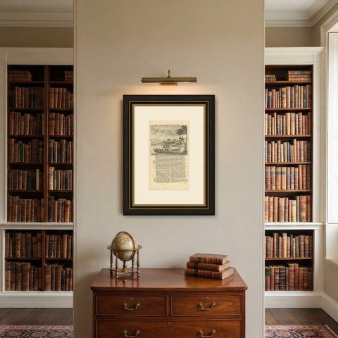 Antique Print of a Boat Near Macassar 'Nowadays Ujung Padang', Indonesia, 1726, shown framed on a wall, true to size