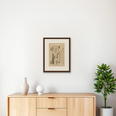 Antique Print with Weapons of Borneo 'Indonesia' by Temminck, circa 1840, shown framed on a wall, true to size