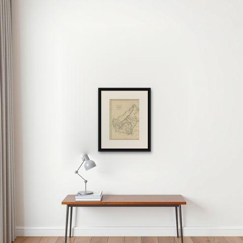Antique Map of the Island of Borneo by W. G. Blackie, 1859, shown framed on a wall, true to size