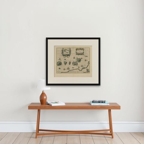 Antique Map of the Maluku Islands by Blaeu, c.1640, shown framed on a wall, true to size