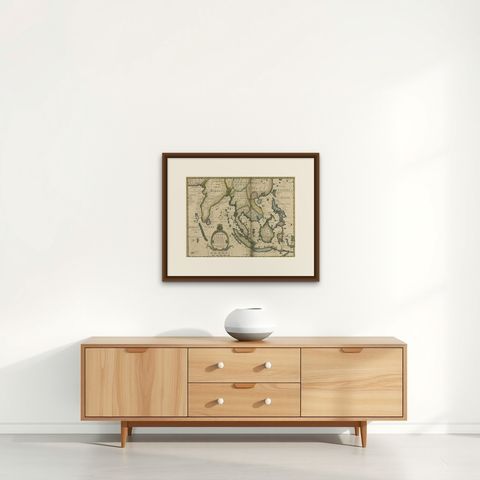 Antique Map of Southeast Asia from Persia to the Timor Island, 1712, shown framed on a wall, true to size