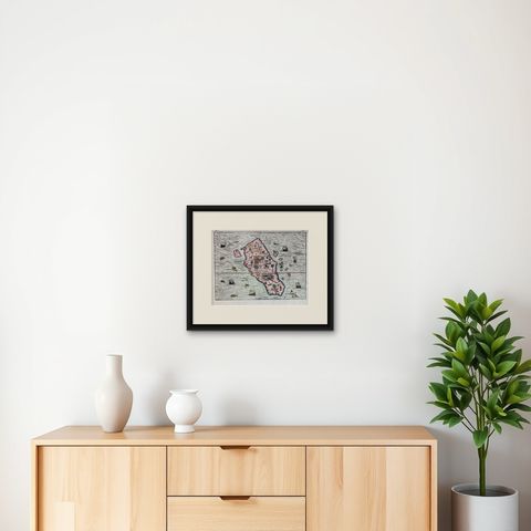 1606 Hand-Colored Woodcut Map of Sumatra from Ramusio’s Delle Navigationi, shown framed on a wall, true to size