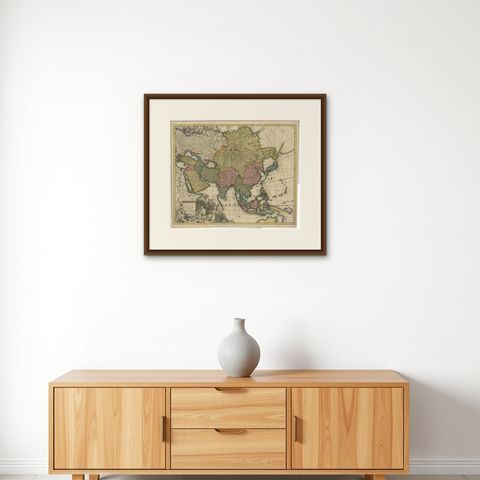 Decorative Antique Map of Asia and the East Indies, circa 1720, shown framed on a wall, true to size