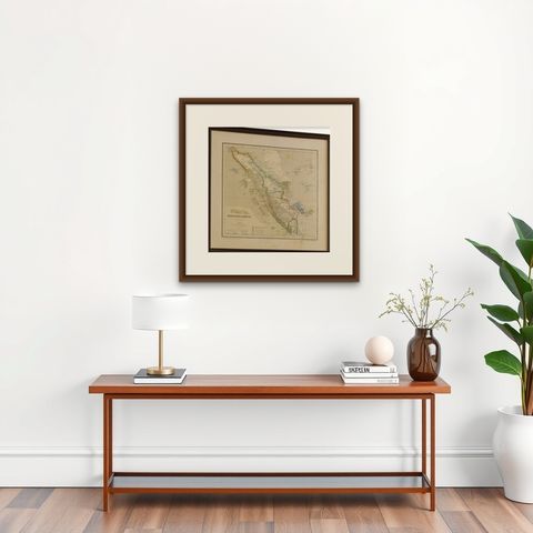 Antique Map of Sumatra, Bangka Belitung and Riau in the Dutch East Indies, 1884, shown framed on a wall, true to size