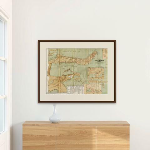 Antique Map of the Gulf of Tomini by Winkler Prins, 1878, shown framed on a wall, true to size