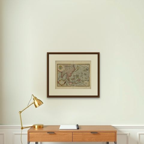 Antique Ortelius Map of Asia Featuring Japan, China, Taiwan & East Indies, 1587, shown framed on a wall, true to size