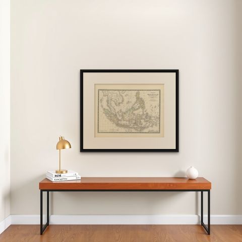 Antique Map of the East Indies by Levasseur, 1875, shown framed on a wall, true to size