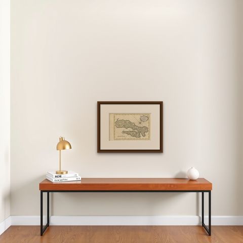 Antique Map of Ambon Island in the Moluccas, Indonesia, c.1760, shown framed on a wall, true to size