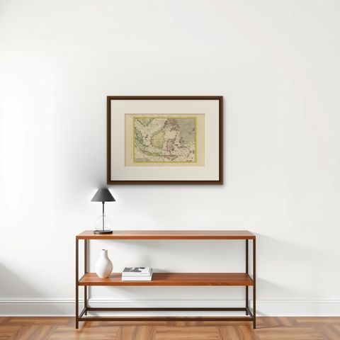 Antique Map of the East Indies by Bonne '1776', shown framed on a wall, true to size