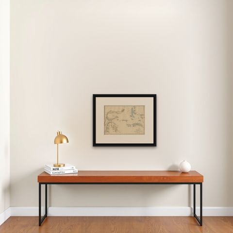 Antique Map of Celebes and the Maluku Islands by W. G. Blackie, 1859, shown framed on a wall, true to size