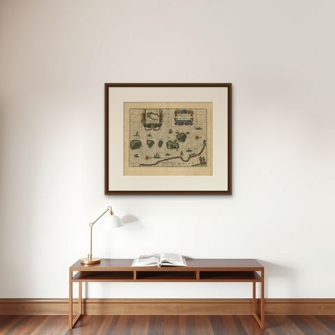 Antique Map of the Spice Islands 'Moluccas', Indonesia by W. Blaeu, circa 1640, shown framed on a wall, true to size