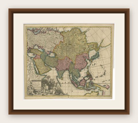 Decorative Antique Map of Asia and the East Indies, circa 1720, shown framed