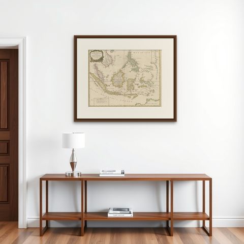 Antique Map of the Indonesian and Philippine Archipelagos by R. de Vaugondy, shown framed on a wall, true to size