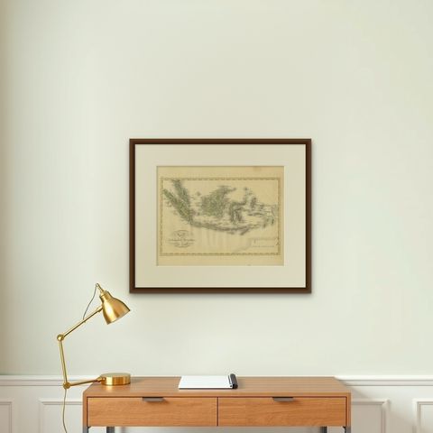 Antique Map of the Dutch East Indies by Van den Bosch '1818', shown framed on a wall, true to size